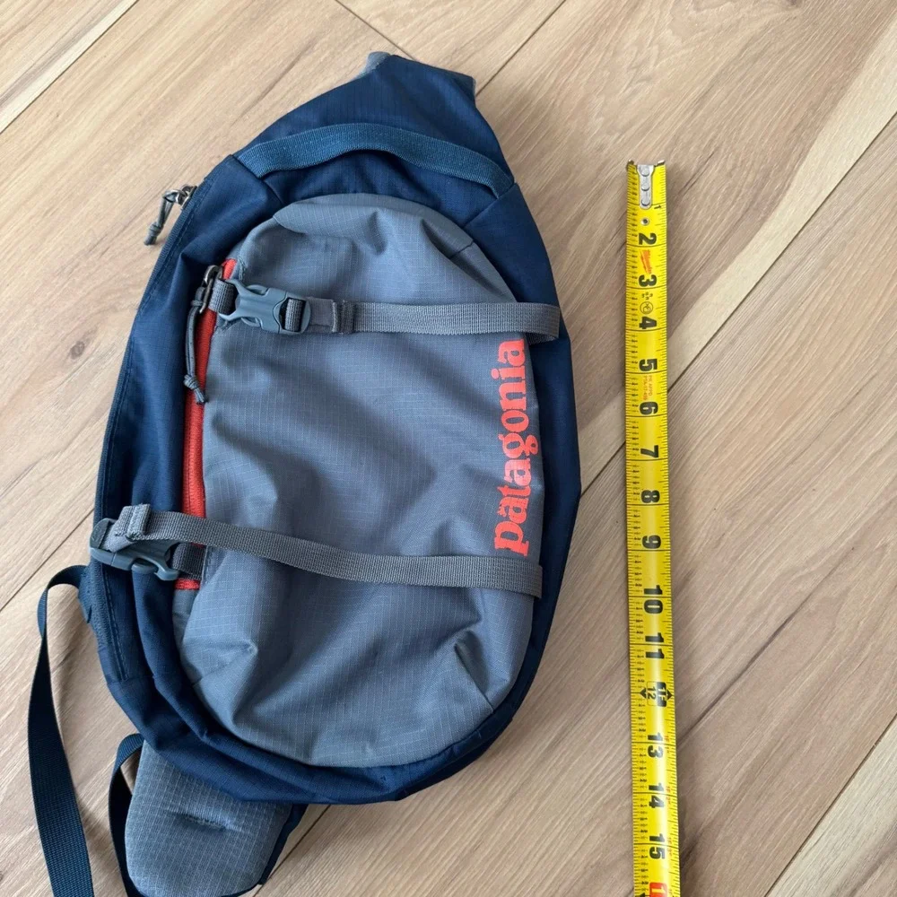Patagonia Atom Sling 8L Backpack Sling Cross Body Bag Navy Blue Grey Orange Logo